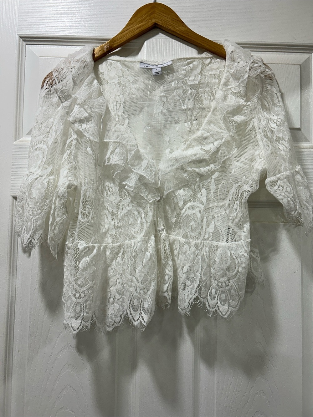 Ivory Lace Ruffle Peplum Blouse